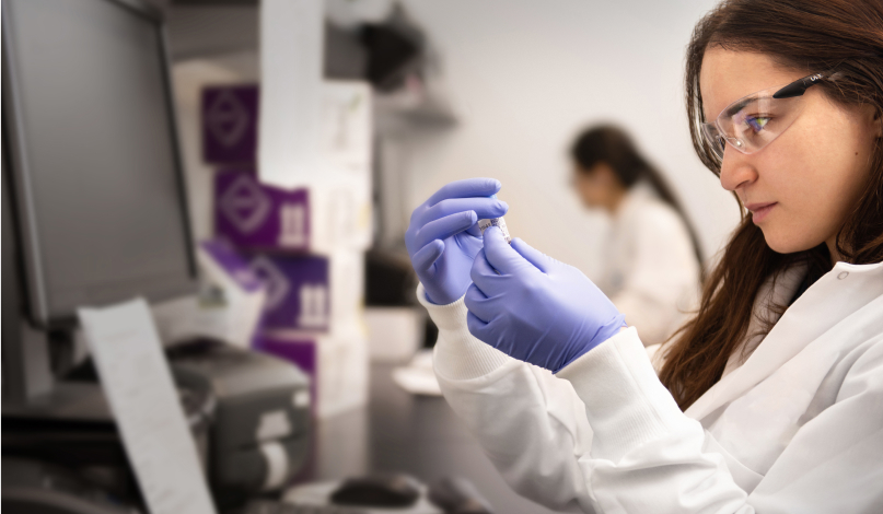 Woman in lab running tests