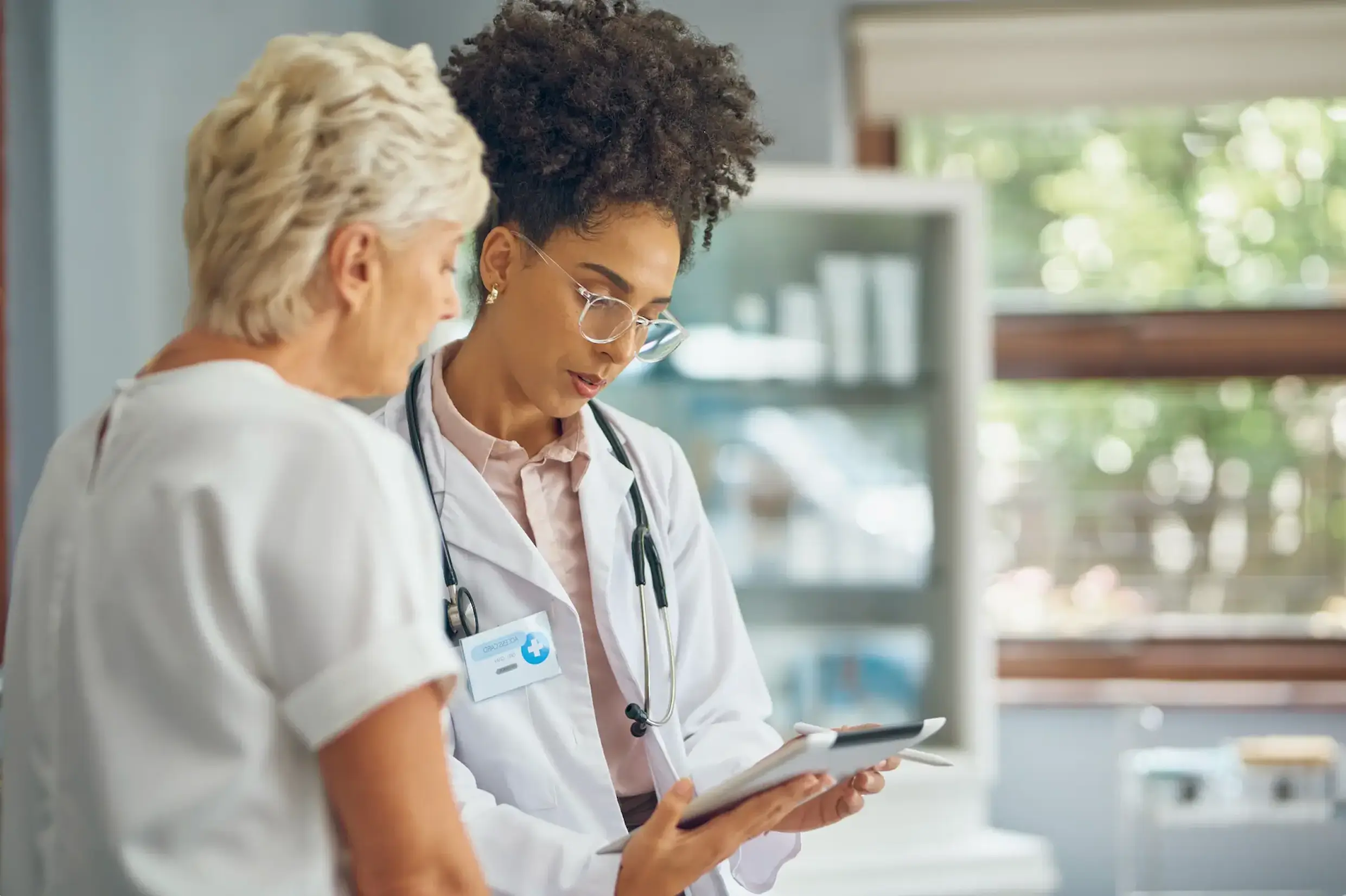 female provider walking through the prosigna ror test report with female patient