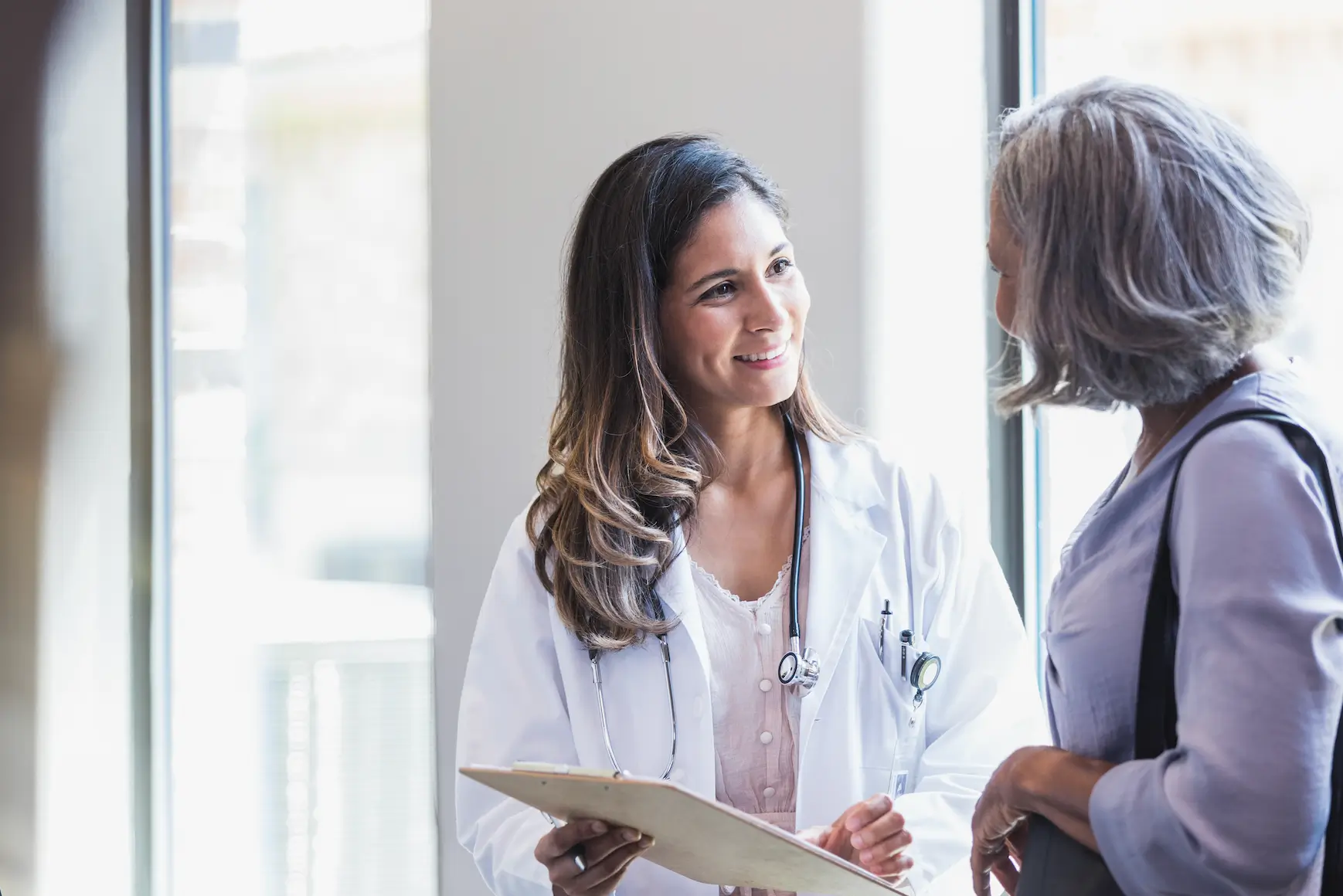 female provider speaking with patient